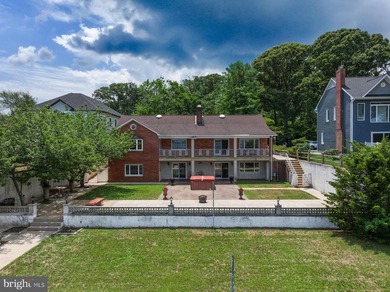 Welcome to this impressive 4,300-square-foot waterfront - photo 3