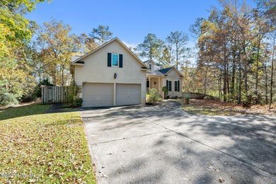 Beautiful 3-bedroom, 3-bath WATERFRONT home on two wooded lots - photo 6