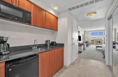 Turnkey condo-hotel unit at Trump International Beach Resort in