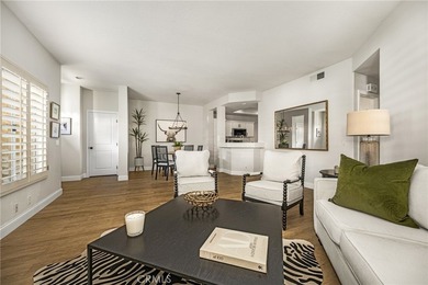 Rare Single-Level End Unit Backing to Mason Regional Park in the