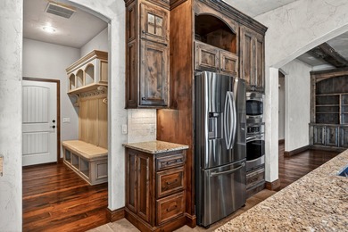 THE VIEW! COMPARE TO NEW CUSTOM BUILDS! An inviting and warm