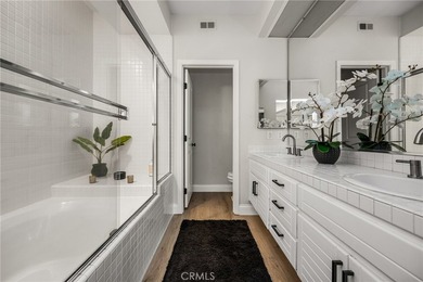 Rare Single-Level End Unit Backing to Mason Regional Park in the