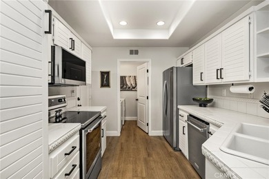 Rare Single-Level End Unit Backing to Mason Regional Park in the