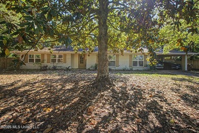 Tucked away on a quiet, tree-lined street, this beautifully - photo 2