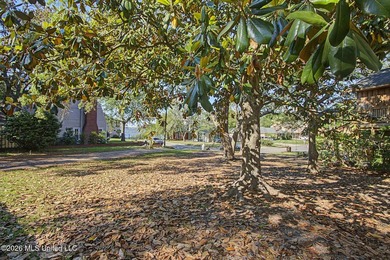 Tucked away on a quiet, tree-lined street, this beautifully - photo 3