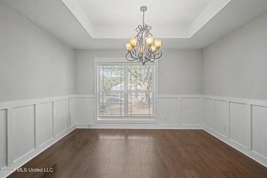 Tucked away on a quiet, tree-lined street, this beautifully - photo 4