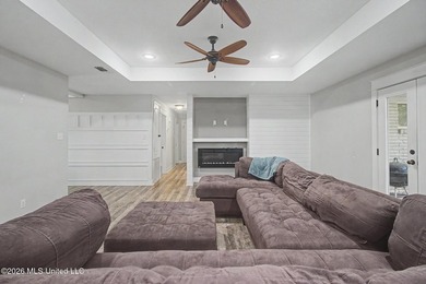 Tucked away on a quiet, tree-lined street, this beautifully - photo 10