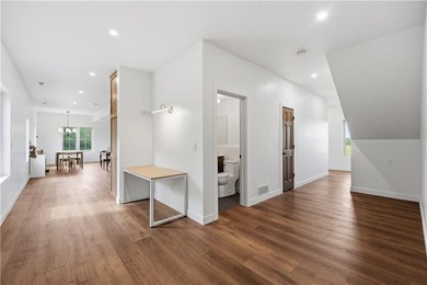 Completed in 2025, this impressive 3,500 sq. ft. home on 8+ - photo 11