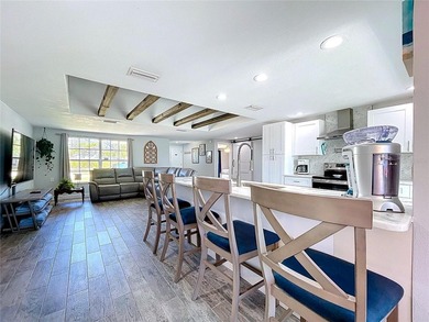 Experience the coastal lifestyle in this exquisitely upgraded - photo 11