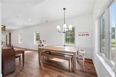 Completed in 2025, this impressive 3,500 sq. ft. home on 8+ - photo 14