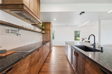 Completed in 2025, this impressive 3,500 sq. ft. home on 8+ - photo 19