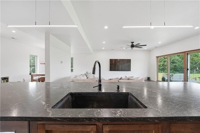 Completed in 2025, this impressive 3,500 sq. ft. home on 8+ - photo 20