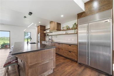 Completed in 2025, this impressive 3,500 sq. ft. home on 8+ - photo 21