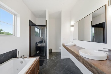 Completed in 2025, this impressive 3,500 sq. ft. home on 8+ - photo 28