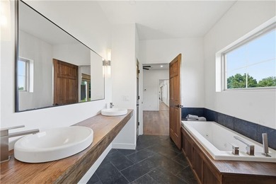 Completed in 2025, this impressive 3,500 sq. ft. home on 8+ - photo 29