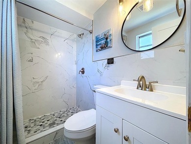 Experience the coastal lifestyle in this exquisitely upgraded - photo 32