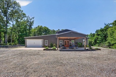 Welcome to this stunning 4 bedroom, 3 bathroom barndominium - photo 1