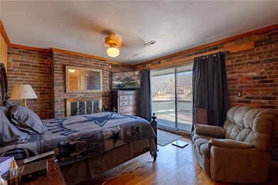 Nestled at the 8 MM in Buck Creek Cove, this lakefront retreat - photo 15