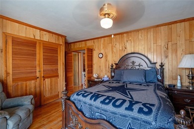 Nestled at the 8 MM in Buck Creek Cove, this lakefront retreat - photo 18
