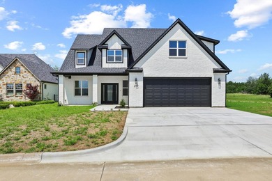 Step inside this stunning home in the gated community of - photo 1