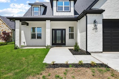 Step inside this stunning home in the gated community of - photo 2