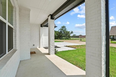 Step inside this stunning home in the gated community of - photo 3