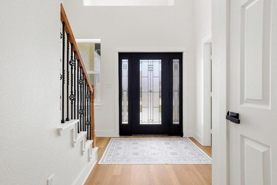 Step inside this stunning home in the gated community of - photo 4