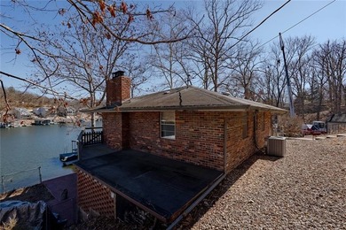 Nestled at the 8 MM in Buck Creek Cove, this lakefront retreat - photo 50
