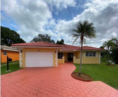 Lake Home For Sale in Coral Springs, Florida