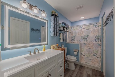 Welcome to this charming 2-bedroom, 2-bath pool home in the - photo 13