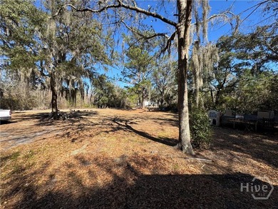 Sitting on a full acre with beautiful mature oaks, this home - photo 4