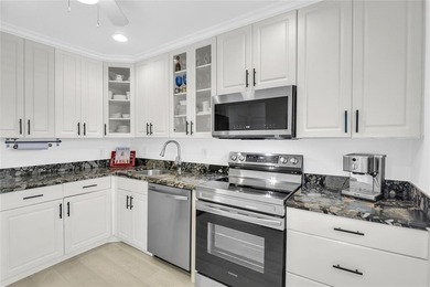 FURNISHED LAKEFRONT CORNER UNIT CONDO in the desirable Cypresses - photo 11