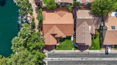 Open and airy with soaring vaulted ceilings throughout! Kitchen