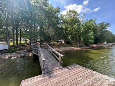 Enjoy lake living in this 2 bed, 2 bath home on beautiful High - photo 11