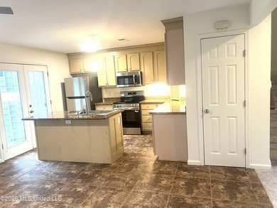 Desirable end unit 2BR/2.5BA townhouse with stylish updates - photo 5