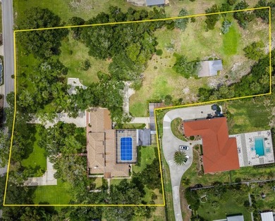 Set on over 3 acres in the heart of Ormond Beach, this - photo 4