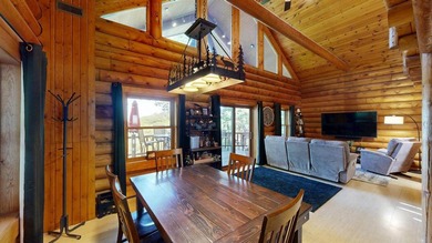 Escape to this cabin-style retreat with gorgeous river views and - photo 12
