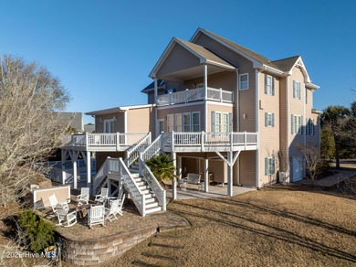 Coastal Elegance with Deeded Beach Access Perfectly positioned