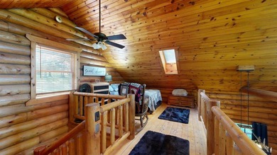 Escape to this cabin-style retreat with gorgeous river views and - photo 17