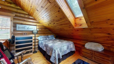 Escape to this cabin-style retreat with gorgeous river views and - photo 18