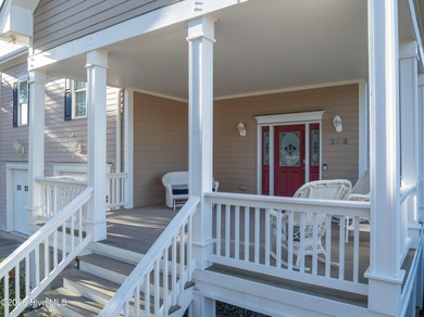 Coastal Elegance with Deeded Beach Access Perfectly positioned