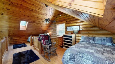 Escape to this cabin-style retreat with gorgeous river views and - photo 19