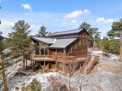 Lake Home For Sale in Red Feather Lakes, Colorado