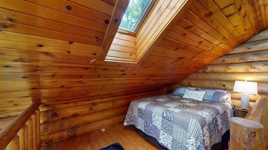 Escape to this cabin-style retreat with gorgeous river views and - photo 22