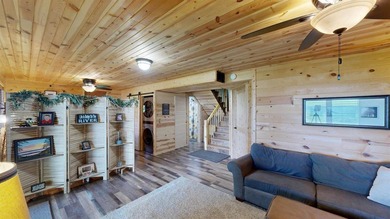 Escape to this cabin-style retreat with gorgeous river views and - photo 26