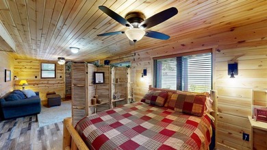 Escape to this cabin-style retreat with gorgeous river views and - photo 28