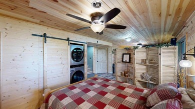 Escape to this cabin-style retreat with gorgeous river views and - photo 29