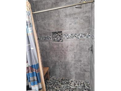 Complete renovation, including Hurricane windows, to the studs - photo 9