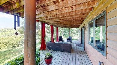 Escape to this cabin-style retreat with gorgeous river views and - photo 41