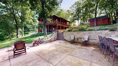 Escape to this cabin-style retreat with gorgeous river views and - photo 47